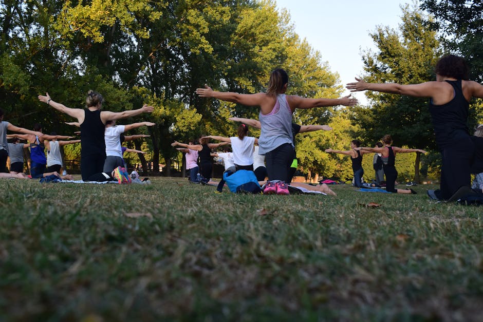 group of people participating in an outdoor mindfulness session - wellness retreat Austin group of people participating in an outdoor mindfulness session - wellness retreat Austin